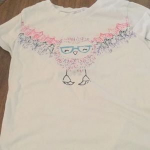 A short sleeve shirts that is white.